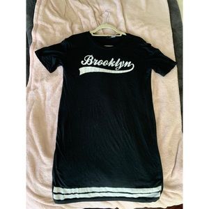 T shirt dress with “Brooklyn” on the front.